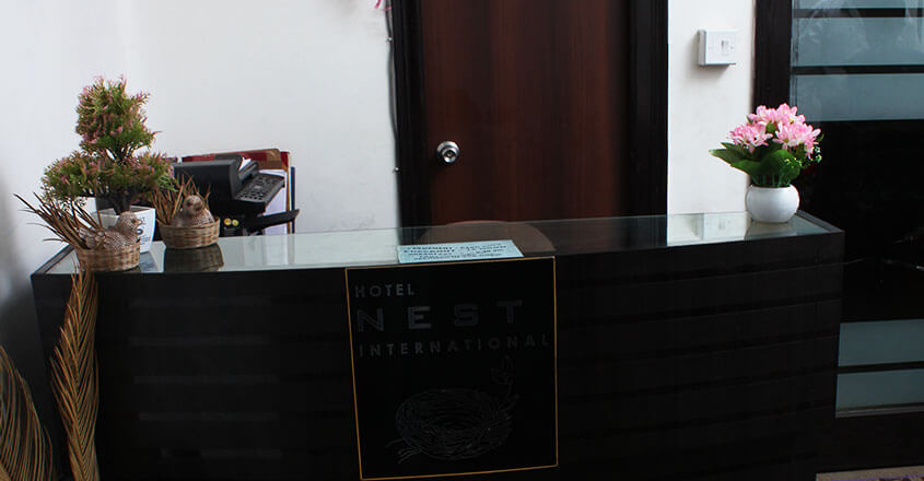 Hotel Nest International Banner
